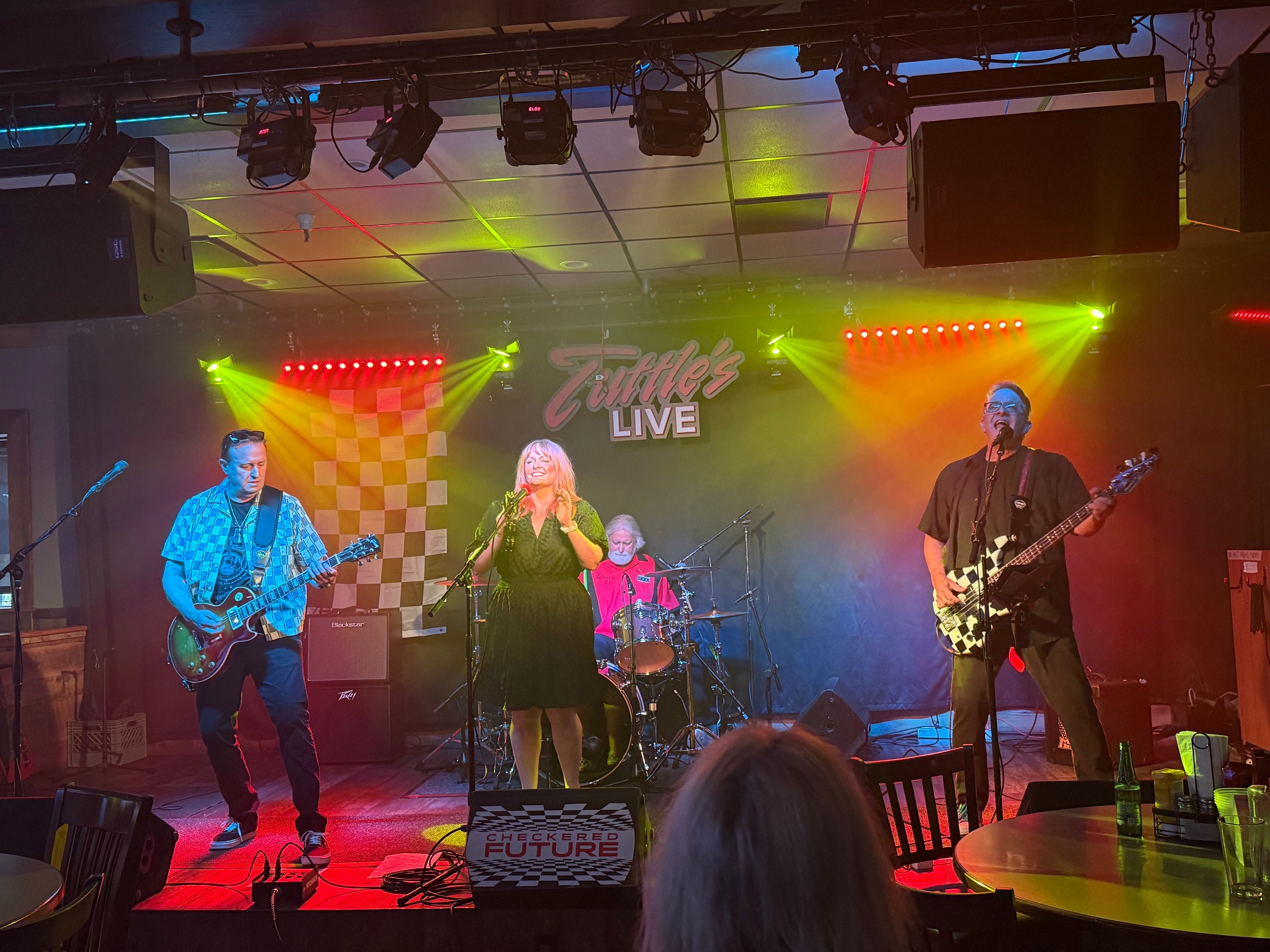 Checkered Future live on stage