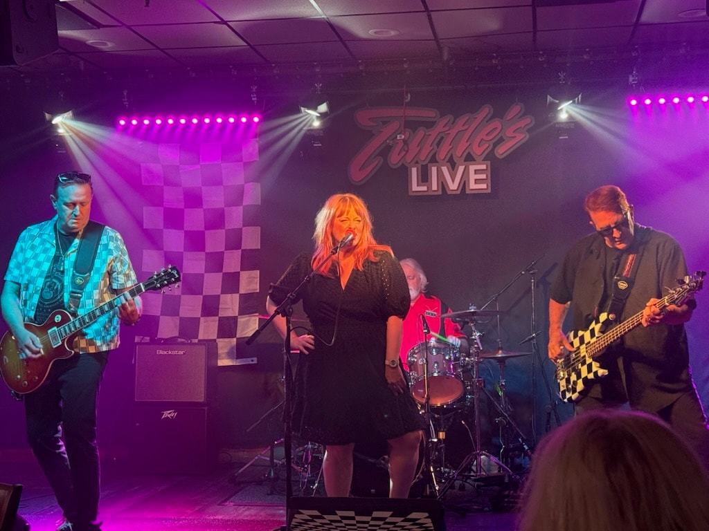 Checkered Future live on stage